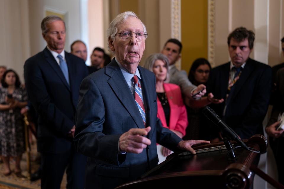 Senate Minority Leader Mitch McConnell, R-Ky., returns to his news conference on July 26, 2023, after the 81-year-old froze at the microphones for almost 30 seconds.