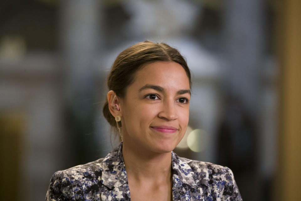 Rep. Alexandria Ocasio-Cortez, D-N.Y., prepares to do a television interview on Capitol Hill, Thursday, June 27, 2019 in Washington. (AP Photo/Alex Brandon)