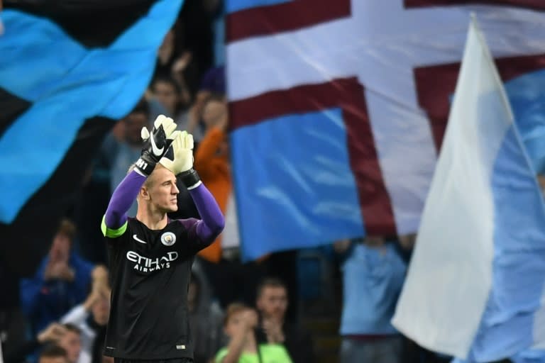 Manchester City's English goalkeeper Joe Hart gestures to the crowd after the UEFA Champions League second leg play-off football match between Manchester City and Steaua Bucharest on August 24, 2016