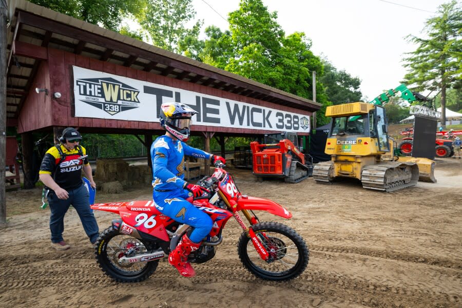 MX Southwick 2023 Hunter Lawrence rides past The Wick sign.jpg