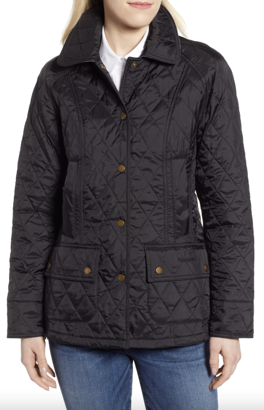 blonde model in black Barbour Beadnell Summer Quilted Jacket (Photo via Nordstrom)