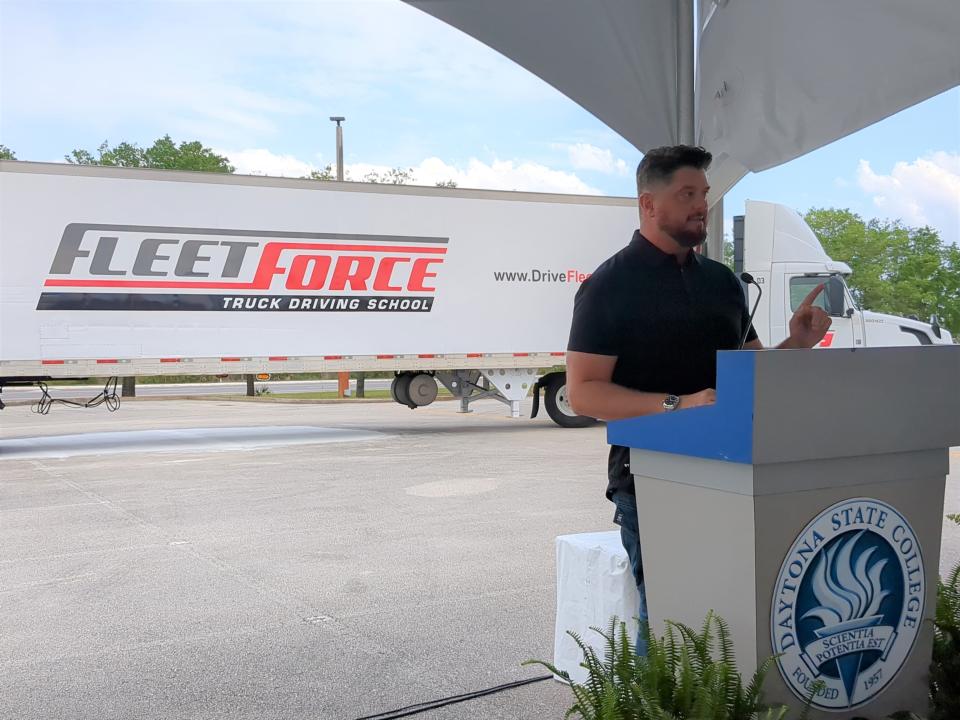 Tra Williams, president of FleetForce Truck Driving School, speaks at a ribbon-cutting event at the Advanced Technology College in Daytona Beach on Tuesday, March 28, 2023. The school, working with Daytona State College, will offer CDL training starting April 10.