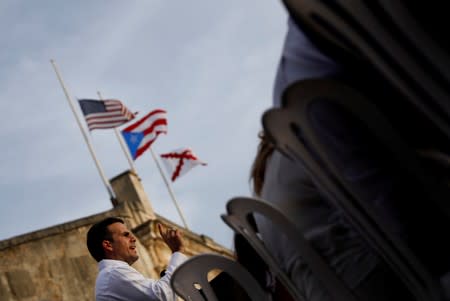 FILE PHOTO: Governor of Puerto Rico Ricardo Rossello delivers remarks during a commemorative event organized by the local government a year after Hurricane Maria devastated Puerto Rico, in San Juan, Puerto Rico