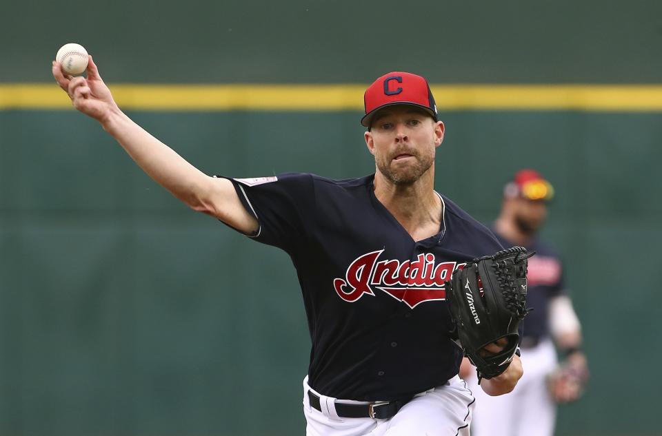 Cleveland Indians starting pitcher Corey Kluber warms up prior to a spring training baseball game against the Cincinnati Reds Monday, March 11, 2019, in Goodyear, Ariz. (AP Photo/Ross D. Franklin)