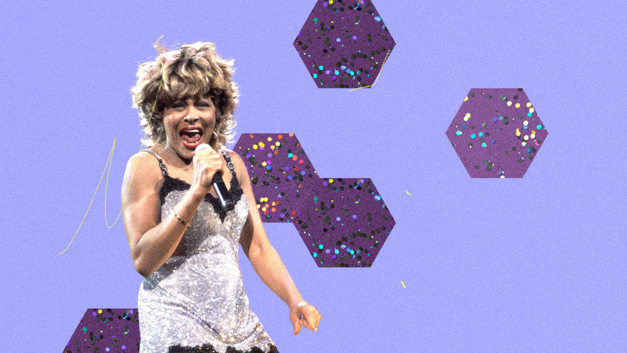 Tina Turner sings into a microphone.