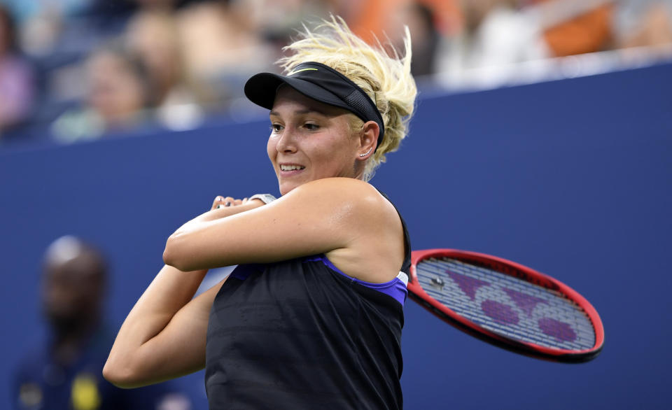 Donna Vekic, of Croatia, returns to Julia Goerges, of Germany, during the fourth round of the US Open tennis championships Monday, Sept. 2, 2019, in New York. (AP Photo/Sarah Stier)