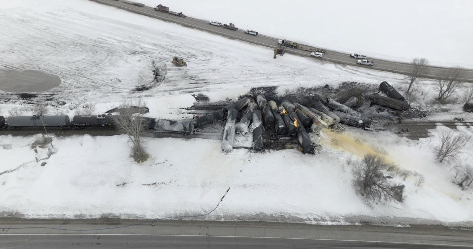 A BNSF train carrying ethanol and corn syrup derailed and caught fire in Raymond, Minn., Thursday, March 30, 2023. BNSF officials said 22 cars derailed, including about 10 carrying ethanol, and the track remains blocked, but that no injuries were reported due to the accident. The cause of the derailment hasn't been determined. (Mark Vancleave /Star Tribune via AP)