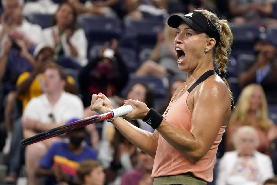 Angelique Kerber, of Germany, reacts after winning a point against Leylah Fernandez, of Canada, during the fourth round of the US Open tennis championships, Sunday, Sept. 5, 2021, in New York. (AP Photo/John Minchillo)