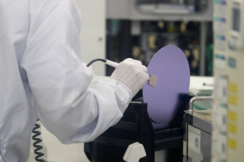 A employee works at a clean room of National Nanofab Center in Daejeon