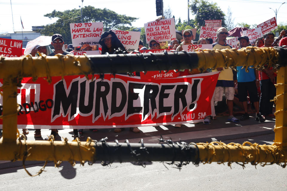 Protesters display placards during a rally at the Lower House to coincide with the joint Senate and Congress vote for the third extension of Martial Law in southern Philippines Wednesday, Dec. 12, 2018 in suburban Quezon city, northeast of Manila, Philippines. In their statement, various opposition groups condemned the extension of Martial Law which allegedly will “lead to untimely death of more community leaders, human rights defenders, Indigenous Peoples, and Muslim opposition groups.” (AP Photo/Bullit Marquez)