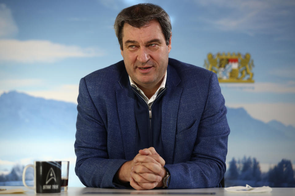 Bavarian state governor Markus Soeder attends an Associated Press interview in Nuremberg, Germany, Thursday, Feb. 18, 2021. Markus Soeder is many things: state governor of Bavaria, Star Trek fan, a conservative for whom combating climate change is an article of faith. The question Germans are asking now is: can the 54-year-old win enough backing across the political spectrum to succeed Angela Merkel as chancellor in September. (AP Photo/Matthias Schrader)