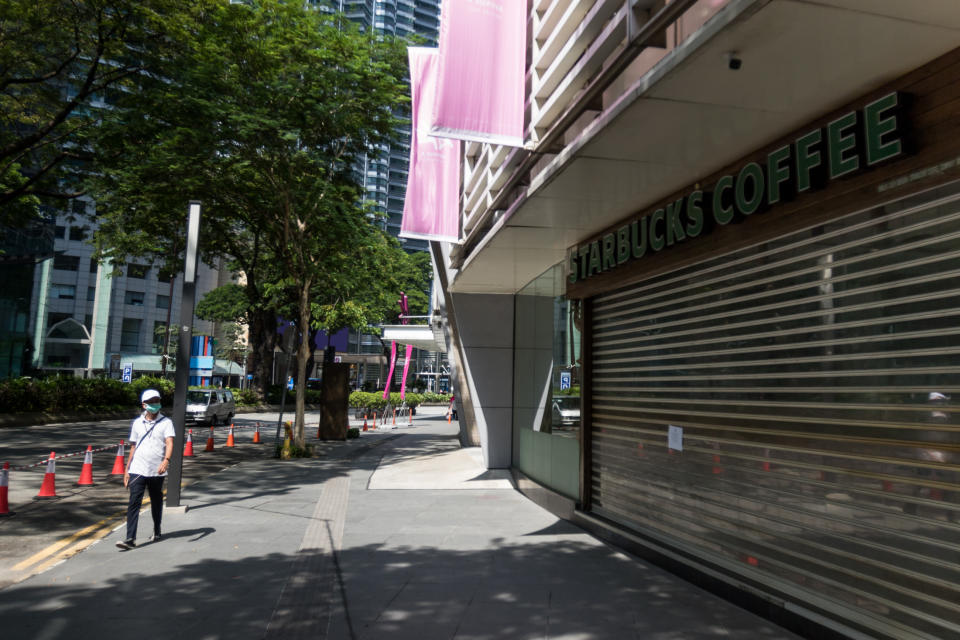 A closed Starbucks Coffee outlet along the usually bustling Jalan Ampang, seen on 18 March 2020, the first day of the Movement Control Order. (PHOTO: Fadza Ishak for Yahoo Malaysia)