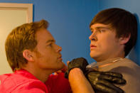 Michael C. Hall as Dexter Morgan and Sam Underwood as Zach Hamilton in the "Dexter" Season 8 episode, "Are We There Yet?"