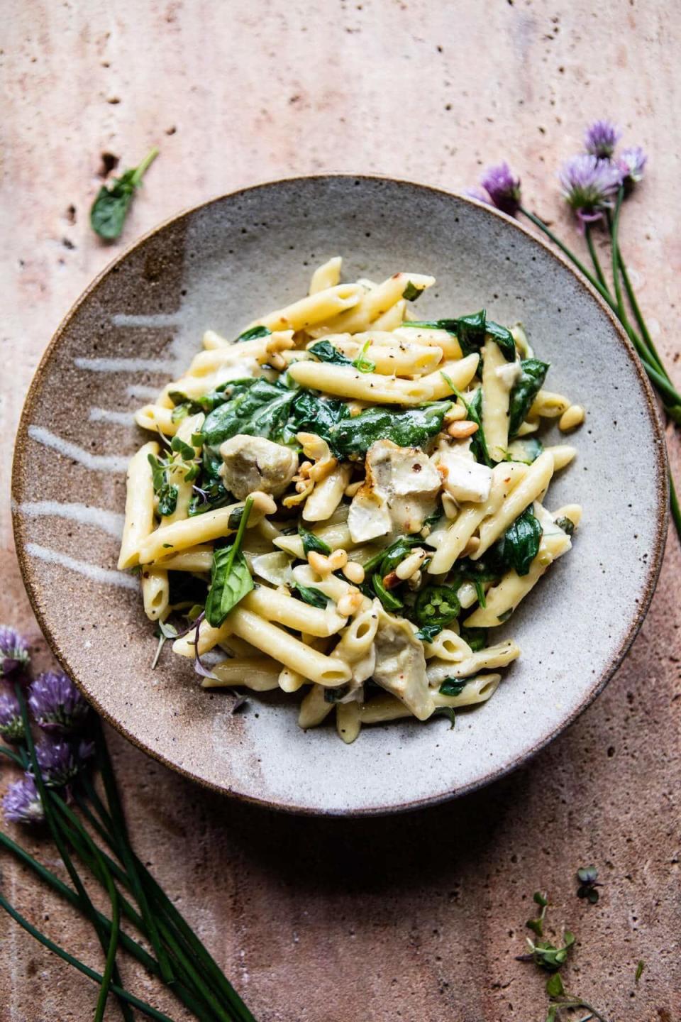 <strong>Get the <a href="https://www.halfbakedharvest.com/lemony-spinach-and-artichoke-brie-penne-pasta/?highlight=pasta" target="_blank">Lemon Spinach and Artichoke Brie Penne Pasta</a> recipe from Half Baked Harvest</strong>