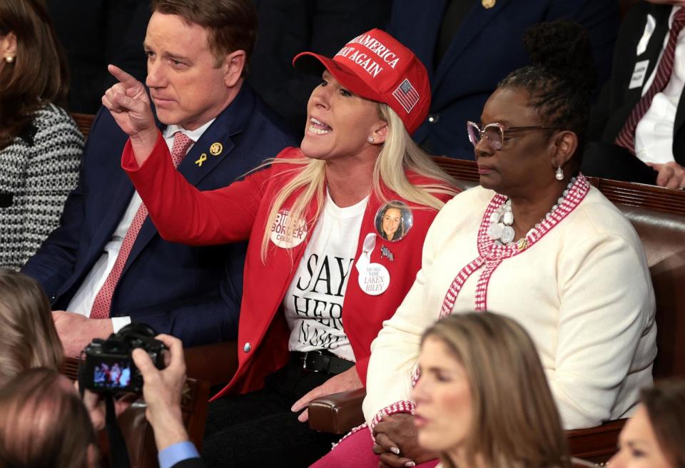 PHOTO: Rep. Marjorie Taylor Greene calls out as President Joe Biden delivers the State of the Union address during a joint meeting of Congress in the House chamber at the U.S. Capitol, on March 7, 2024, in Washington, D.C.  (Win McNamee/Getty Images)