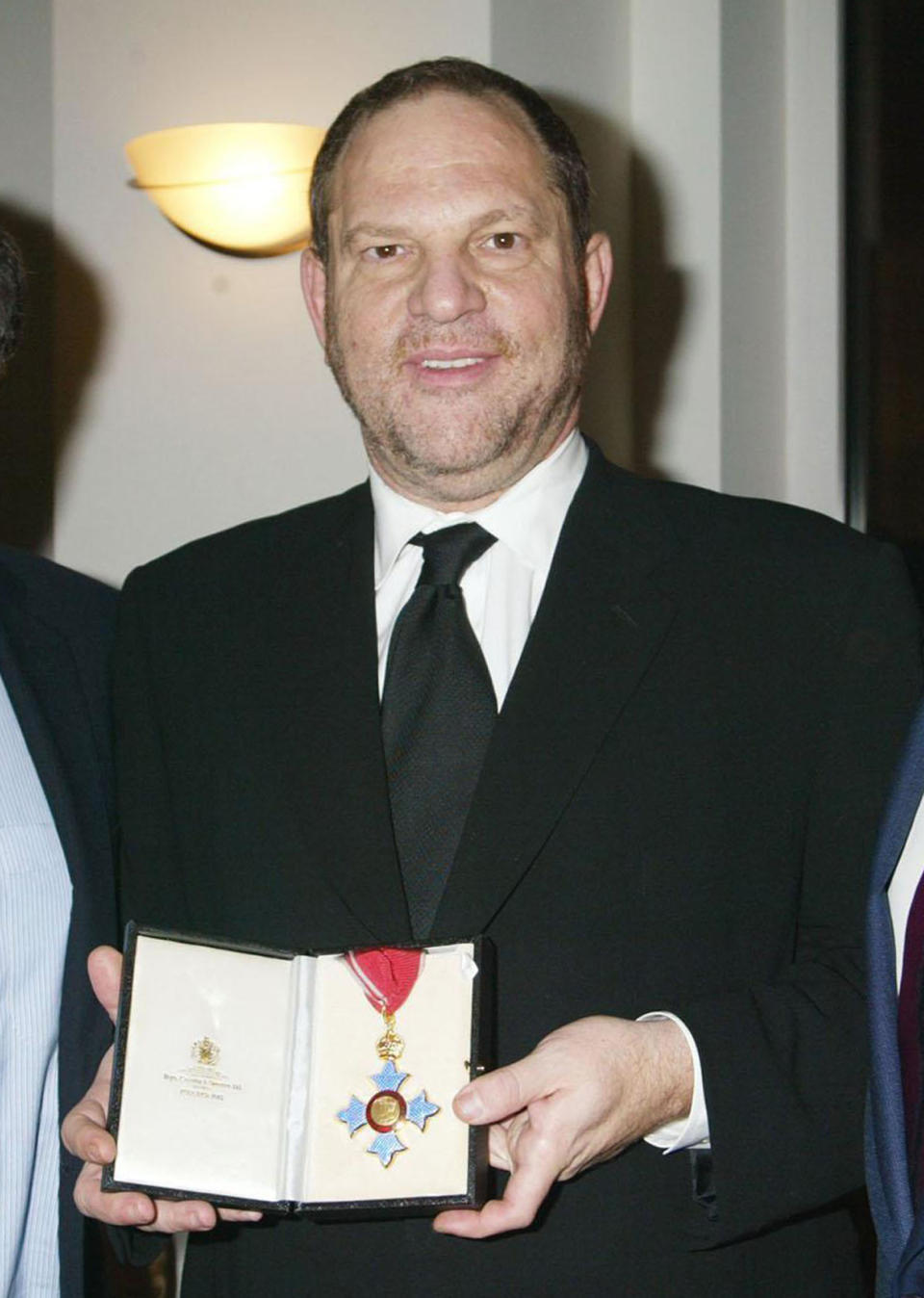 TIME OF DISTRIBUTION: IMMEDIATE NOVEMBER 24 PRNewswire, London, 24/11/2004: Harvey Weinstein received a CBE, Commander of the British Empire, at an investiture ceremony at the Residence of the British Consul General on Monday, November 22, 2004 in New York City.  Photo includes (from left to right) Miramax co-chairmen Bob Weinstein and Harvey Weinstein and the British Consul General Sir Philip Thomas, Courtesy of DMIPhoto.  Media contact: Matthew.hiltzik@miramax.com, tel +1-212-941-3883, Sarah.levinson@miramax.com, tel +1-212-941-3875.  Visit www.mediapoint.press.net or www.prnewswire.co.uk. Media Contact:  Matthew.hiltzik@miramax.com , tel +1-212-941-3883, Sarah.levinson@miramax.com,  tel +1-212-941-3875 (PRNewsFoto) ... PRN_FILM_Miramax_Weinstein ... 24-11-2004 ... LONDON ... GBR ... Photo credit should read: Press Association Images. Unique Reference No. 2139769 ... 