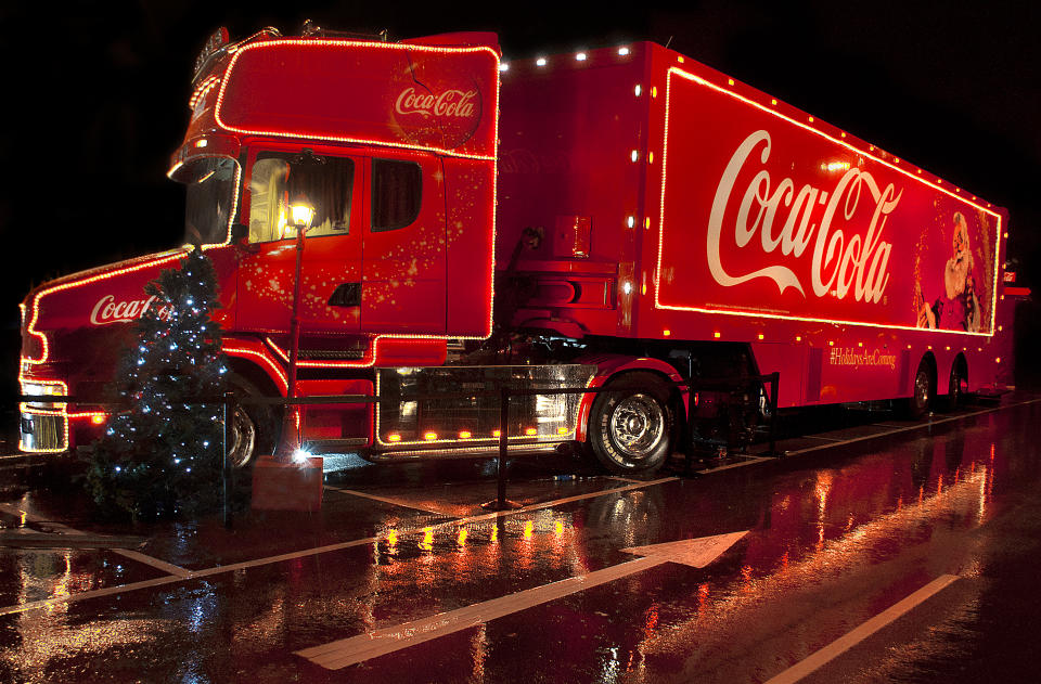 A Coca Cola lorry comes into town to light up the local supermarket car park in December 2012.