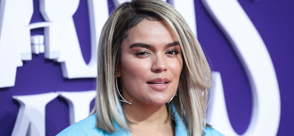 CENTURY CITY, LOS ANGELES, CALIFORNIA, USA - OCTOBER 06: Singer Karol G arrives at the World Premiere Of MGM's 'The Addams Family' held at the Westfield Century City AMC on October 6, 2019 in Century City, Los Angeles, California, United States. 06 Oct 2019 Pictured: Karol G, Carolina Giraldo Navarro. Photo credit: Xavier Collin/Image Press Agency/MEGA TheMegaAgency.com +1 888 505 6342 (Mega Agency TagID: MEGA521756_005.jpg) [Photo via Mega Agency]