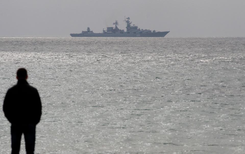 The Russian warship "Moskva" ("Moscow"), a Slava class guided missile cruiser, off the Black Sea shore in 2014.