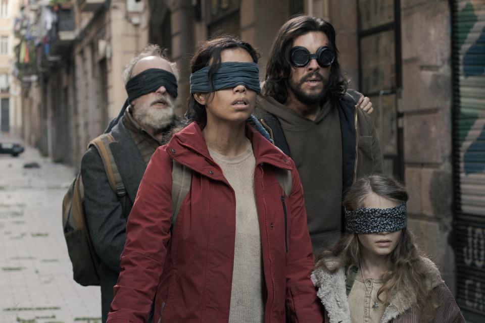 Roberto (Gonzalo de Castro, left), Claire (Georgina Campbell), Sebastian (Mario Casas) and Sofia (Naila Schuberth) travel Spanish streets attempting to avoid a deadly threat in Netflix's "Bird Box Barcelona."