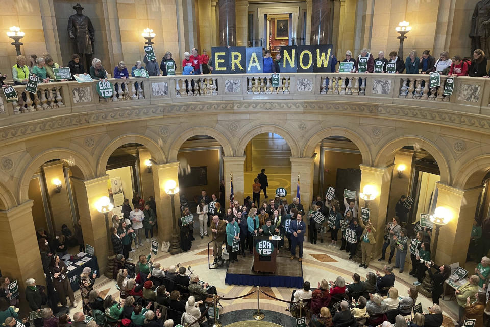 Hundreds of people hold signs and cheer at a rally in support of Minnesota's Equal Rights Amendment proposal in the state's capitol building in St. Paul, Minnesota, on Feb. 12, 2024, the first day of Minnesota's legislative session for the year. If passed by the state Legislature and then by Minnesotans in a statewide ballot vote, an ERA to the state constitution would further protect abortion rights, as well as gender identity and expression, in the state. (AP Photo/Trisha Ahmed)