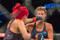 Randa Markos lands a punch on Ashley Yoder's face. (PHOTO: Dhany Osman / Yahoo News Singapore)
