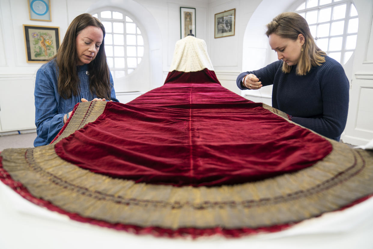 Work is carried out on King Charles III's Robe of State, which he will wear at his coronation on May 6, by members of the Royal School of Needlework, at Hampton Court Palace, in East Molesey. Picture date: Monday February 27, 2023. (Kirsty O'Connor / PA Wire)