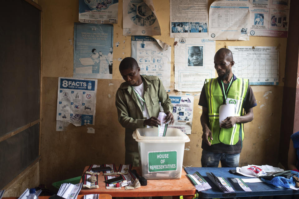 Electoral workers count the ballots at a polling station during the presidential elections in Agulu, Nigeria, Saturday, Feb. 25, 2023. Voters in Africa's most populous nation are heading to the polls Saturday to choose a new president, following the second and final term of incumbent Muhammadu Buhari. (AP Photo/Mosa'ab Elshamy)