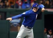 Oct 26, 2016; Cleveland, OH, USA; Chicago Cubs first baseman Anthony Rizzo reacts after scoring a run against the Cleveland Indians in the fifth inning in game two of the 2016 World Series at Progressive Field. Charles LeClaire-USA TODAY Sports