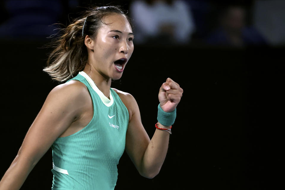 Zheng Qinwen of China reacts during her semifinal against Dayana Yastremska of Ukraine at the Australian Open tennis championships at Melbourne Park, Melbourne, Australia, Thursday, Jan. 25, 2024. (AP Photo/Asanka Brendon Ratnayake)