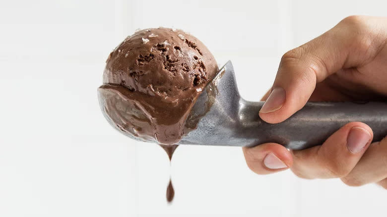 scooping chocolate ice cream