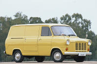 <p>The Transit name was first used for a commercial vehicle developed by Ford of Germany and launched in the mid 1950s, but it’s generally accepted that the current line dates back to the British version which made its debut in October 1965. The most common engine type was a <strong>V4</strong>, which was so short and fitted so snugly under the bonnet that Transits with inline-four or V6 engines required nose extensions.</p><p>A 1977 facelift included a longer nose which could accommodate any engine Ford considered appropriate. While this is sometimes referred to as the Transit <strong>Mark II</strong>, a completely new model was not considered necessary until 1986, more than two decades after the launch of the original.</p>