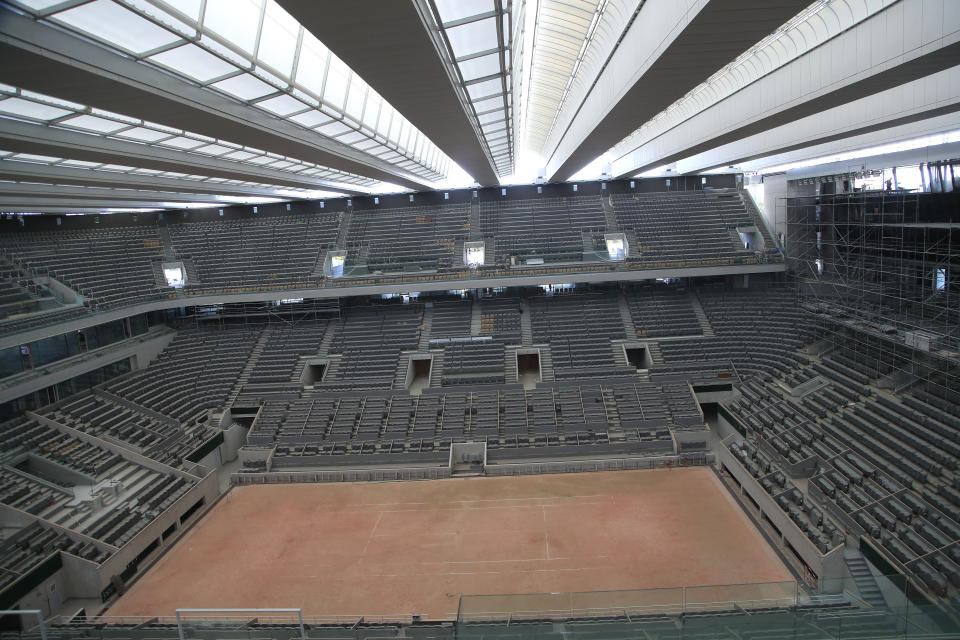 A general view of the Philippe-Chatrier tennis court with its new retractable roof during a media tour at Roland Garros stadium in Paris, Wednesday, May 27, 2020. The French open will moving to September from the end of May because of the outbreak of the COVID-19 disease. (AP Photo/Michel Euler)