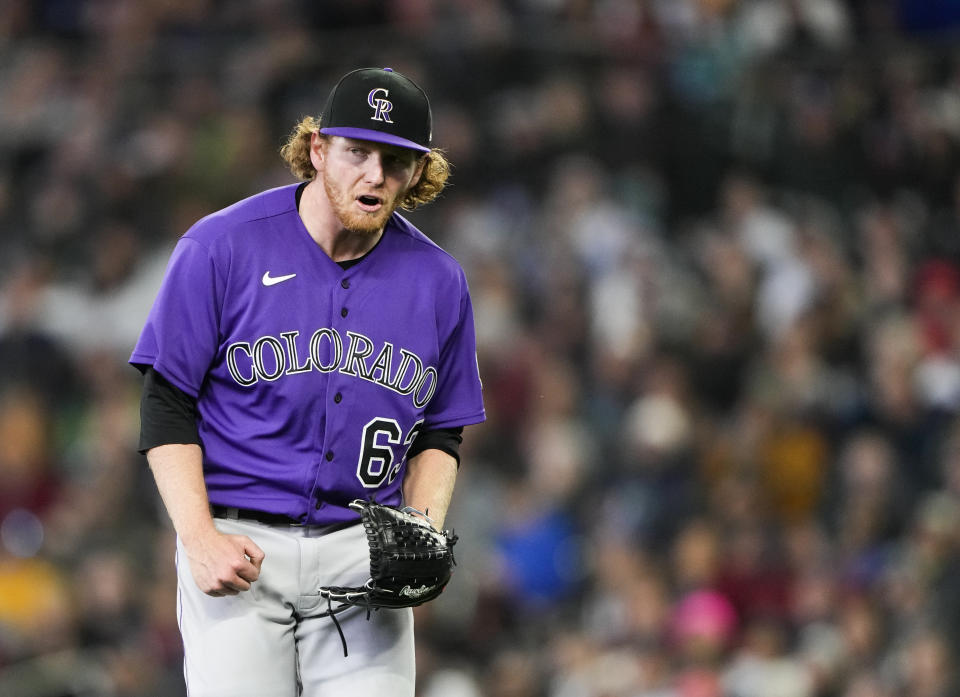 Colorado Rockies starting pitcher Noah Davis reacts after a double play to end the third inning against the Seattle Mariners during a baseball game Sunday, April 16, 2023, in Seattle. (AP Photo/Lindsey Wasson)