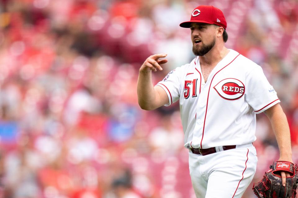 Cincinnati Reds starting pitcher Graham Ashcraft (51) gestures after striking out the last batter in the top of the sixth inning of the MLB baseball game between Cincinnati Reds and Miami Marlins at Great American Ball Park in Cincinnati on Wednesday, Aug. 9, 2023. 
