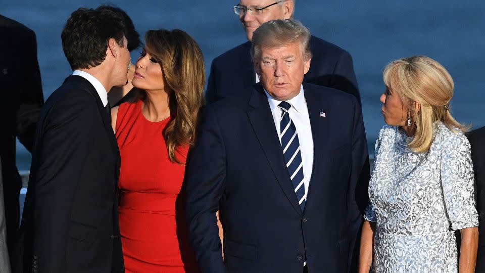 First Lady Melania Trump greets Canadian Prime Minister Trudeau with a kiss on the cheek before a group photo at the G7 summit in Biarritz. - Andrew Parsons/eyevine/i-Images/Redux