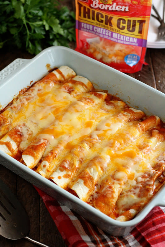 <p>These quick and easy enchiladas only call for 5 ingredients and are ready in no time! It's the perfect recipe for a busy weeknight!</p><p><strong>Get the recipe: <a href="https://southernbite.com/5-ingredient-beef-enchiladas/" rel="nofollow noopener" target="_blank" data-ylk="slk:5-Ingredient Beef Enchiladas;elm:context_link;itc:0;sec:content-canvas" class="link ">5-Ingredient Beef Enchiladas</a></strong></p>
