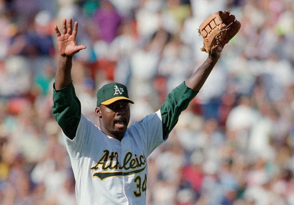 Oakland Athletics pitcher Dave Stewart celebrates the team's 6-2 victory over the Toronto Blue Jays in Game 5 of baseball's AL Championship Series on Oct. 12, 1992, in Oakland, Calif.