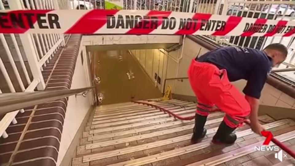 Emergency services were forced to pump out the deep water at Lewisham station. Photo: 7 News