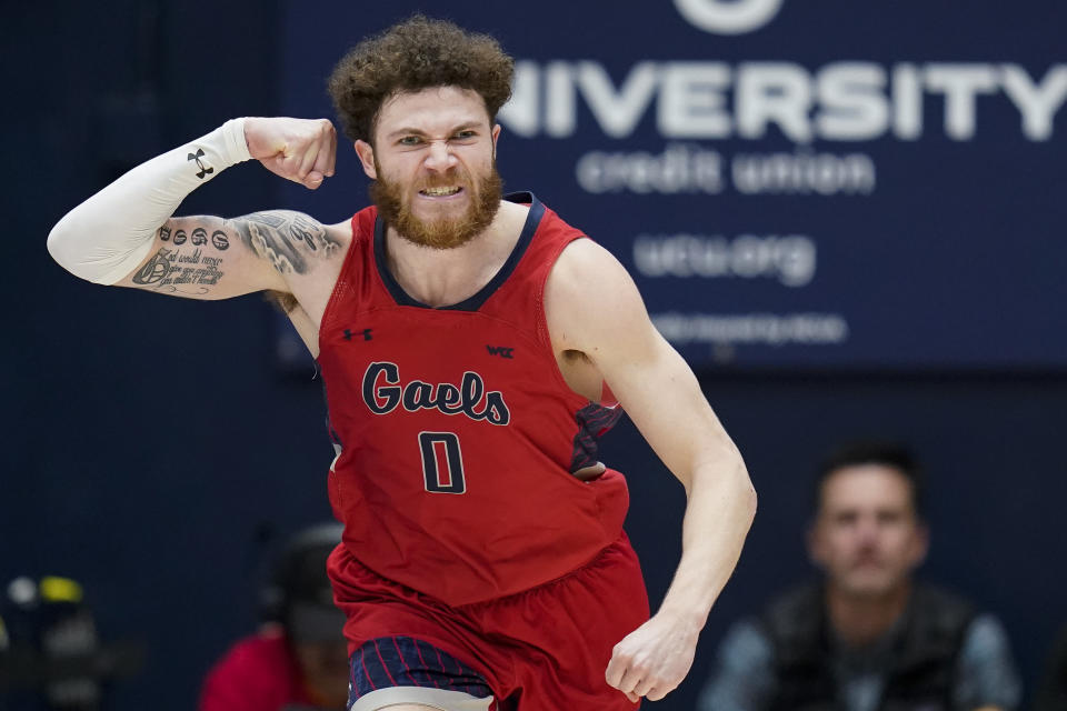 Saint Mary's guard Logan Johnson reacts after scoring against BYU during the second half of an NCAA college basketball game in Moraga, Calif., Saturday, Feb. 18, 2023. (AP Photo/Godofredo A. Vásquez)