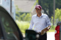 Beto O'Rourke walks a neighborhood in West Dallas Wednesday, June 9, 2021. The former congressman and senatorial candidate is driving an effort to gather voter support to stop Texas' SB7 voting legislation. As politicians from Austin to Washington battle over how to run elections, many voters are disconnected from the fight. While both sides have a passionate base of voters intensely dialed in on the issue, a disengaged middle is baffled at the attention. (AP Photo/LM Otero)