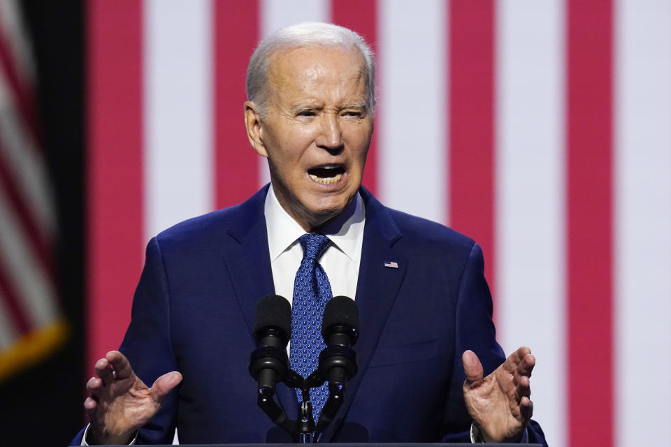 President Joe Biden speaks about democracy and the legacy of Arizona Republican Sen. John McCain at the Tempe Center for the Arts, Thursday, Sept. 28, 2023, in Tempe, Ariz. (AP Photo/Ross D. Franklin)