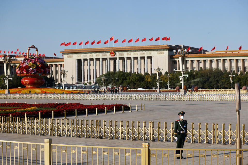 A paramilitary police officer stands guard on the Tiananmen Square, before the opening ceremony of the 20th National Congress of the Communist Party of China at the Great Hall of the People in Beijing, China October 16, 2022. REUTERS/Thomas Peter