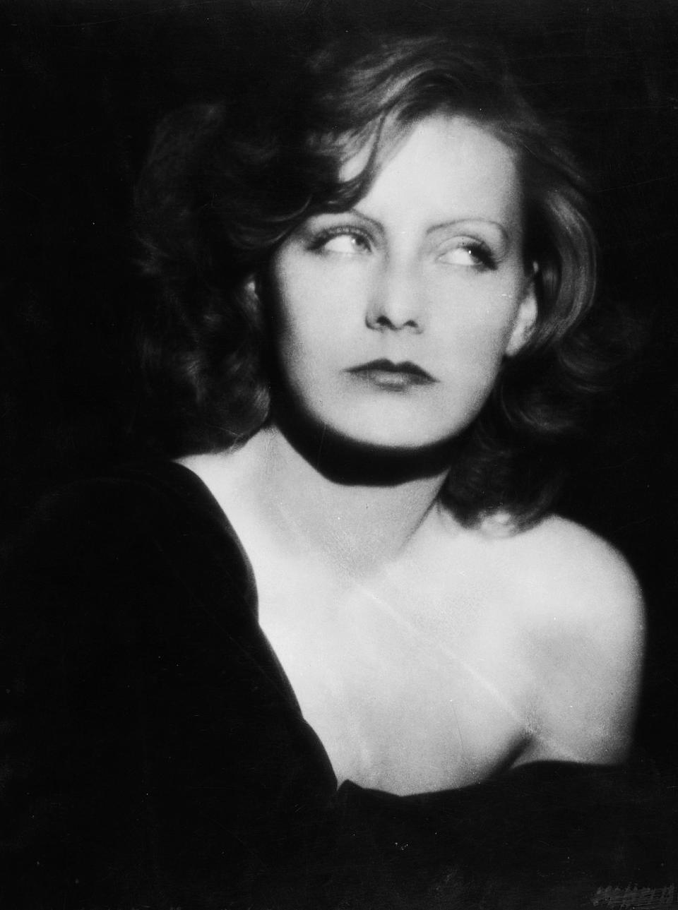<p>Ruth Harriet Louise took this glamorous photo of actress Greta Garbo (and her iconic eyebrows) in 1926. </p>