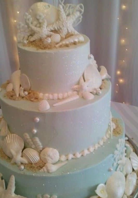 Ocean themed wedding cake a bride gave her baker as inspiration. 