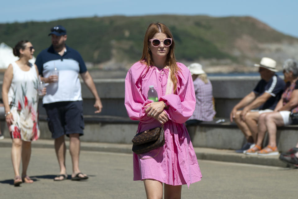 People enjoying the warm weather on Scarborough beach, North Yorkshire. Picture date: Sunday July 10, 2022.