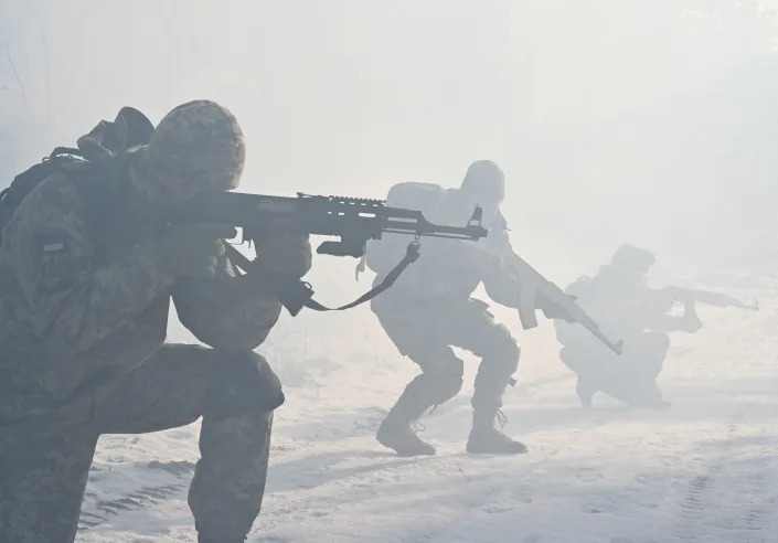 Ukrainian Territorial Defense Forces, the military reserve of the Ukrainian Armes Forces, take part in a military exercise near Kiev on December 25, 2021. (Sergei Supinsky/AFP via Getty Images)