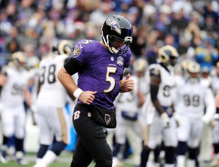 Nov 22, 2015; Baltimore, MD, USA; Baltimore Ravens quarterback Joe Flacco (5) reacts after throwing an interception in the second quarter against the St. Louis Rams at M&T Bank Stadium. Mandatory Credit: Evan Habeeb-USA TODAY Sports