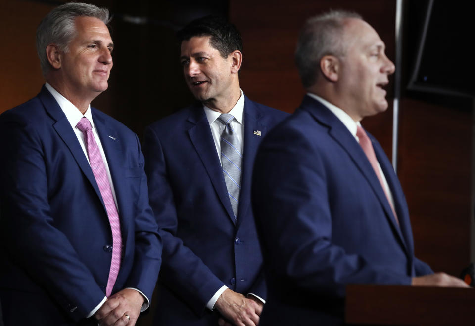 House Speaker Paul Ryan of Wis., center, talks with House Majority Leader Kevin McCarthy of Calif., left, while House Majority Whip Steve Scalise, R-La., speaks during a news conference, Thursday, Sept. 13, 2018, in Washington. (AP Photo/Jacquelyn Martin)