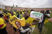 Supporters of Kenyan presidential candidate William Ruto cheer at his final electoral campaign rally at Nyayo stadium in Nairobi, Kenya Saturday, Aug. 6, 2022. Kenya is due to hold its general election on Tuesday, Aug. 9 as the East Africa's economic hub chooses a successor to President Uhuru Kenyatta. (AP Photo/Ben Curtis)